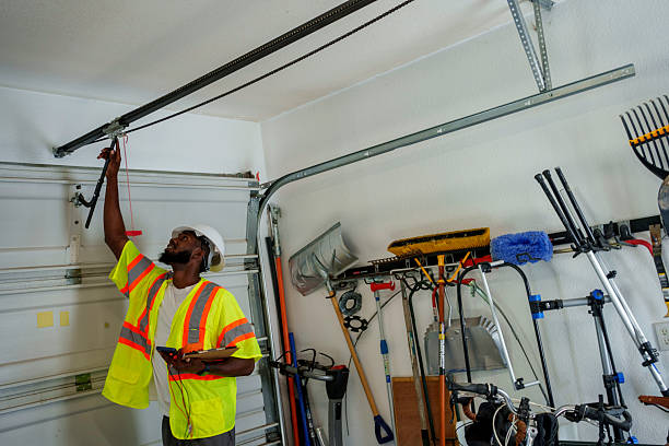 Professional Garage Door Panel Replacement technician working in Union Springs, NY